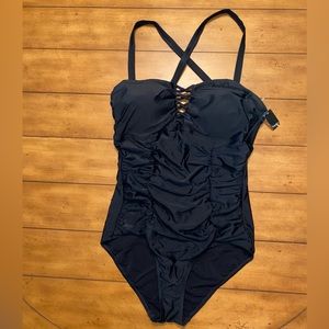 Torrid black rouched one piece swimsuit size 0, NWT. Adjustable straps